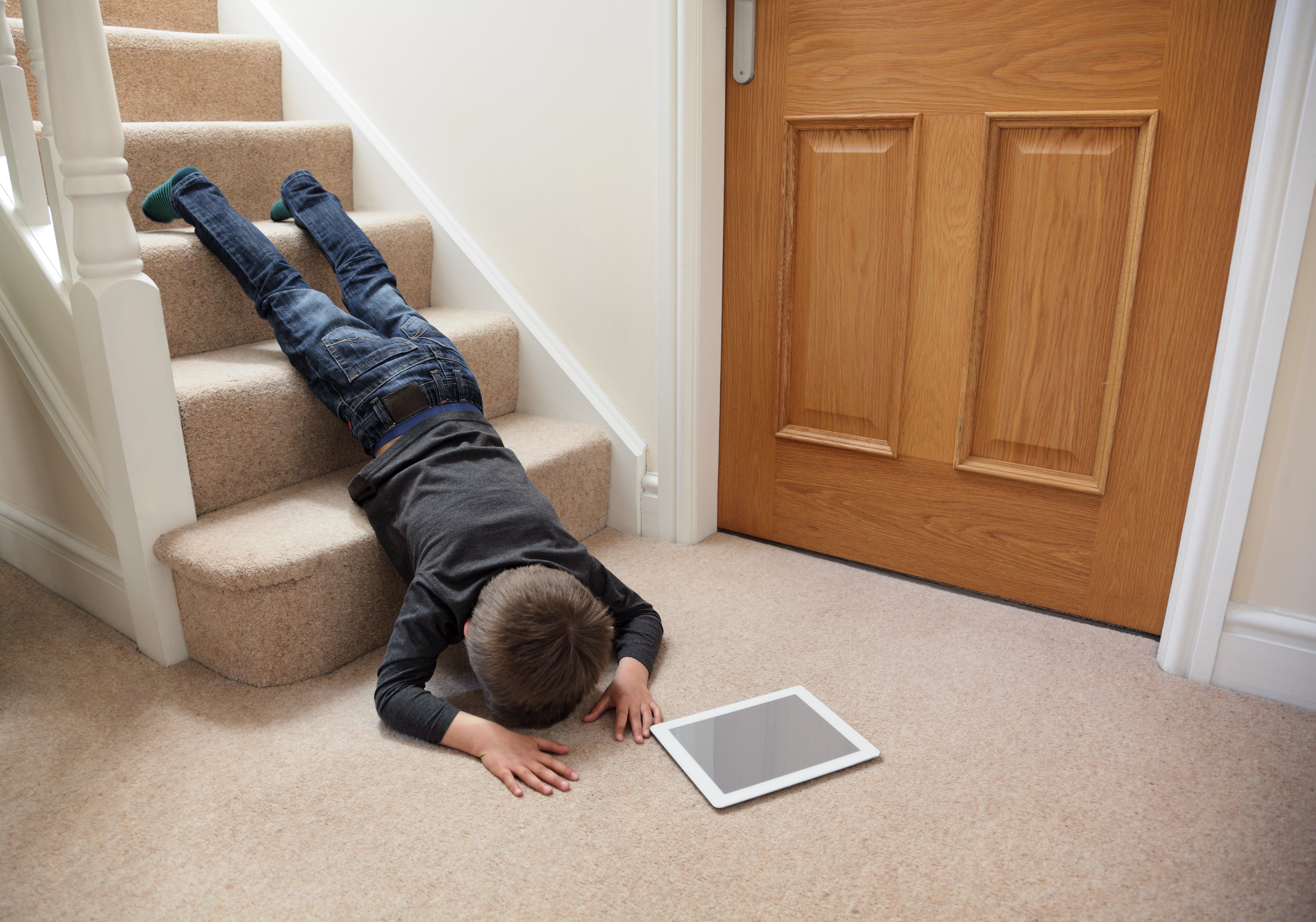 Broken on the floor. Мальчик падает с лестницы. Человек оступился на лестнице.